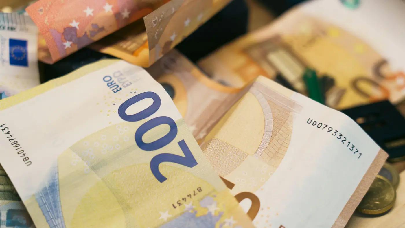 Close-up of assorted euro banknotes symbolizing finance, currency, and budget management.